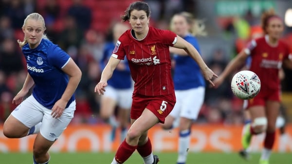 Liverpool's Niamh Fahey turns away from Everton Women's Elise Hughes during the FA Women's Super League match at Anfield last month
