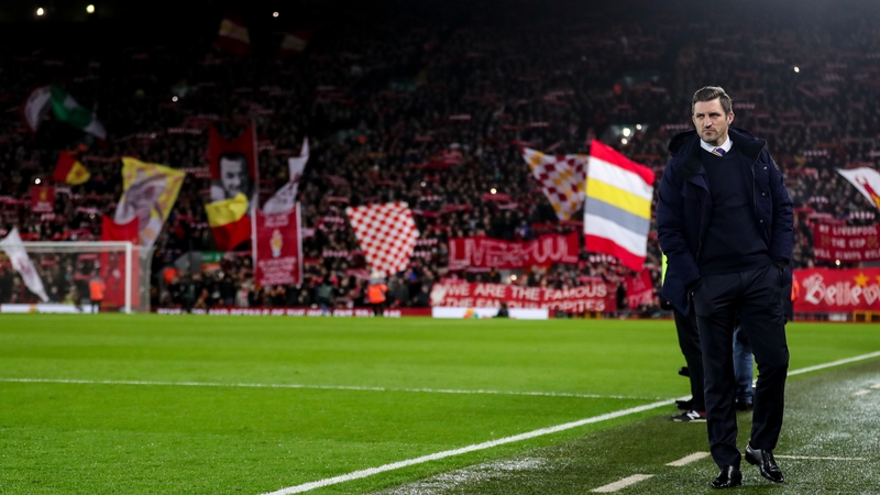 Shrewsbury manager Sam Ricketts surveying the action at Anfield