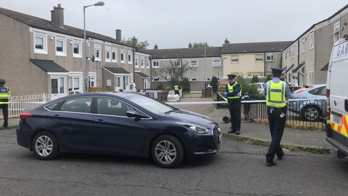 Gardaí on duty in the Darndale estate where two people were stabbed today
