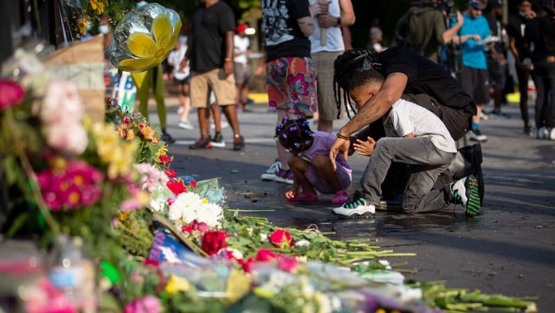 A makeshift memorial has been set up near to where Rayshard Brooks was shot