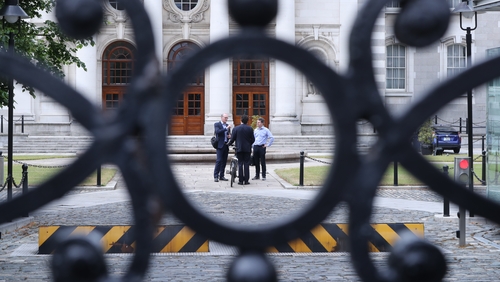 Tánaiste and Foreign Affairs Minister Simon Coveney, Green Party leader Eamon Ryan and Minister for Finance and Public Expenditure and Reform Paschal Donohoe arrive at Govt Buildings