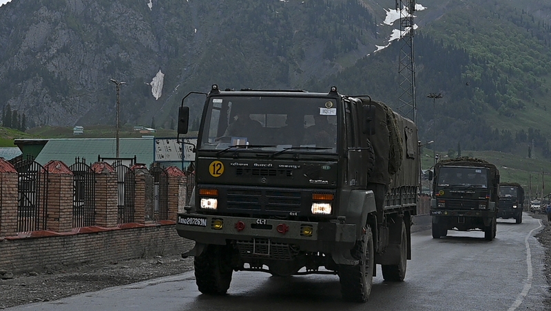 Indian army trucks travel along the Srinagar-Leh Highway in the disputed region