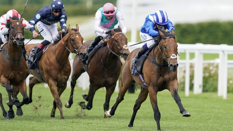 Jockey Jim Crowley rides Battaash (R) to victory in The King's Stand Stakes