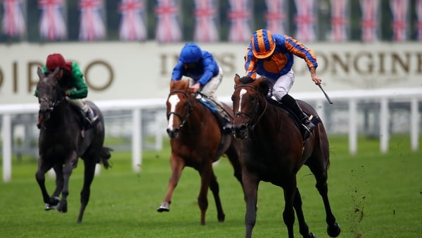 Battleground ridden by Ryan Moore (right) on their way to winning the Chesham