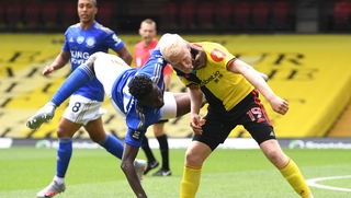 Wilfred Ndidi of Leicester City tangles with Watford's Will Hughes