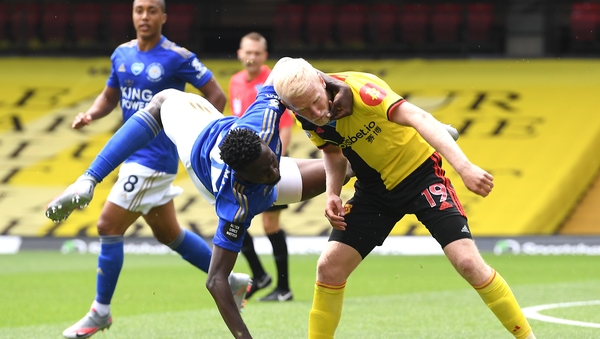 Wilfred Ndidi of Leicester City tangles with Watford's Will Hughes