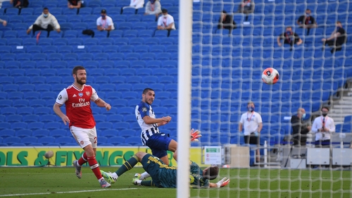 Brighton's French striker Neal Maupay (C) scores the winner