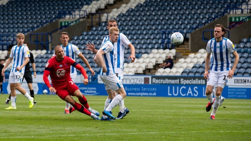 Anthony Pilkington scores Wigan's second goal in the win over Sheffield Wednesday