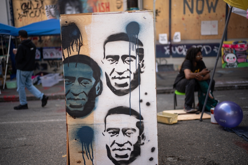 Images of George Floyd are seen in the 'police-free' autonomous zone in Seattle