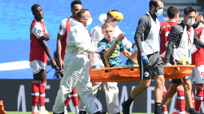Bernd Leno is stretchered off at the Amex