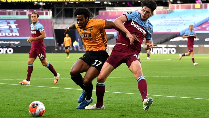Wolverhampton Wanderers' Adama Traore holds of West Ham's Declan Rice at London Stadium