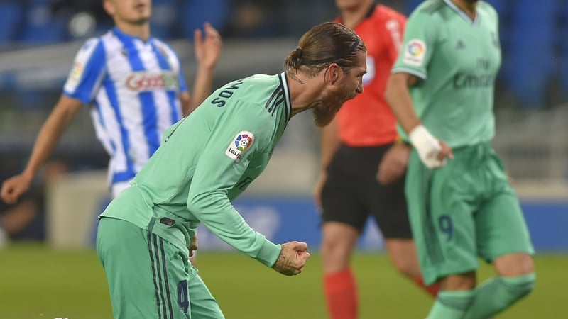 Sergio Ramos celebrates as he scores from the spot