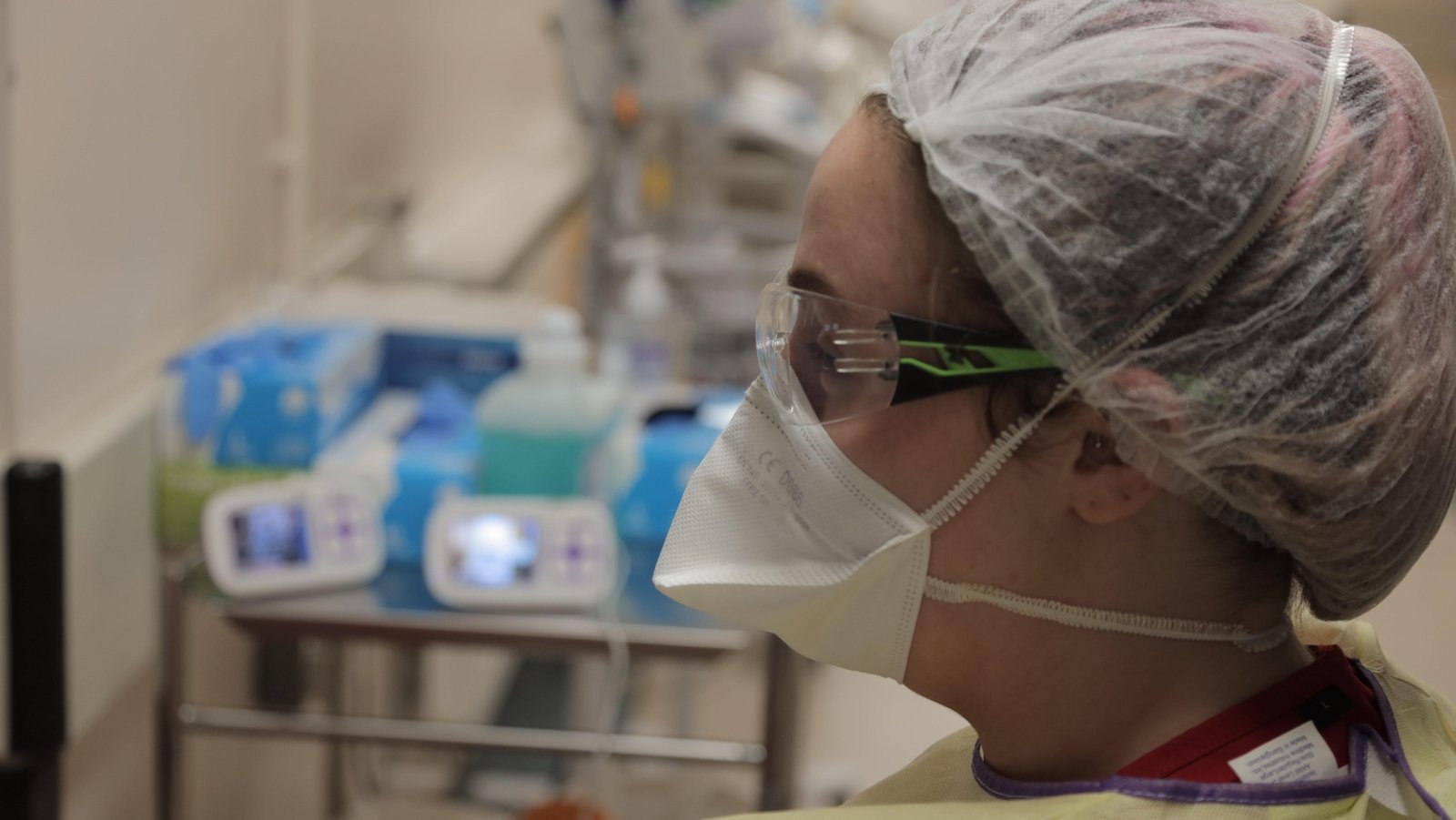 A nurse spends her shift observing Covid positive patients on baby monitors