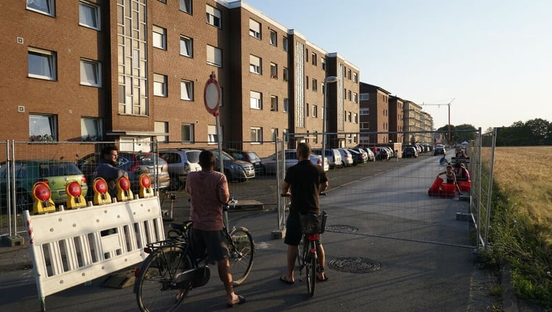 An apartment building is placed under quarantine in Guetersloh following a Covid-19 outbreak at a nearby abattoir