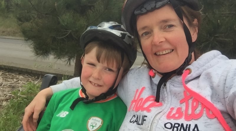 Siobhán Madigan and her seven-year old son Cillian, who is a big Dubs fan like his mother
