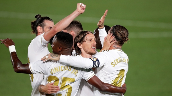 Sergio Ramos is swamped after scoring Real Madrid's second goal