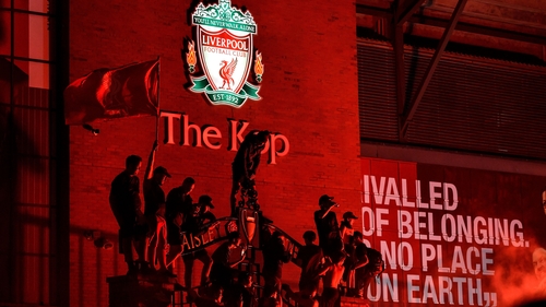 Liverpool fans celebrate their team's title triumph