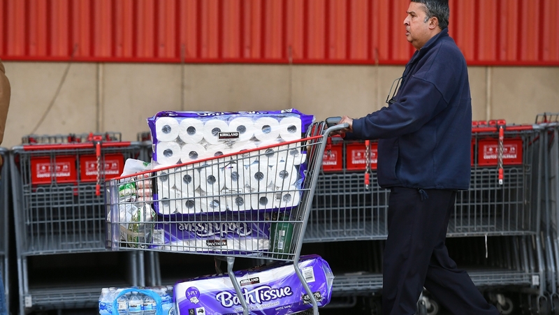 A shopper in Melbourne stocks up on toilet roll as people fear lockdown return