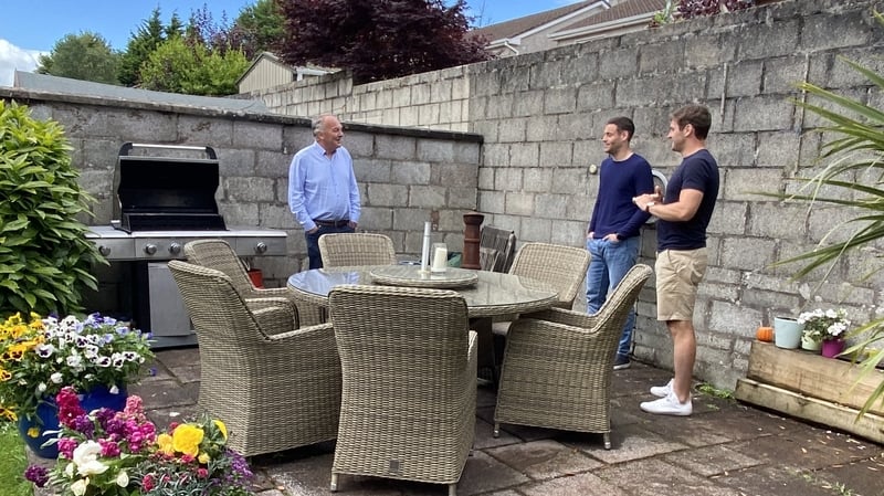 Micheál Martin's proud son Micheál Aodh (centre) is pictured in Cork today with his cousin Shane and uncle Seán Martin