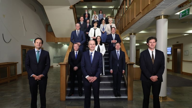 The new cabinet pose for a socially distant snap: "government at any time is at the mercy of events"