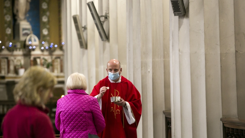 Father Ciaran McDermott celebrates mass at the Pro Cathedral in Dublin
