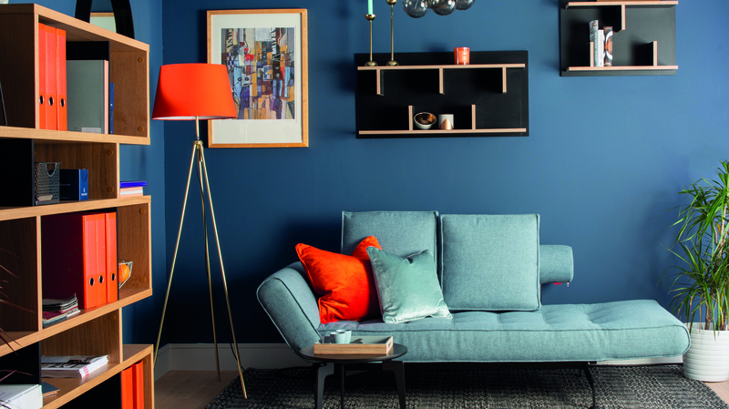A strong colour choice, mixed with playful orange accents and a unique furnishings create this modern home office designed by Helena Cousins of Zinc Interiors.