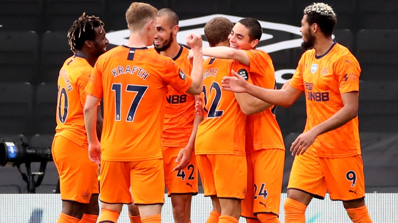 Miguel Almiron celebrates after scoring Newcastle's third