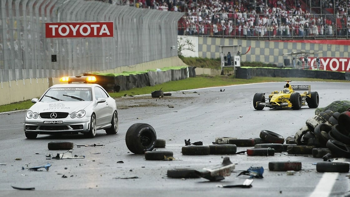 Giancarlo Fisichella negotiates his way to victory