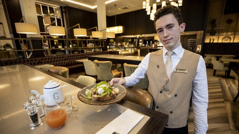 James Allen serves breakfast at the reopened Grand Central Hotel in Belfast
