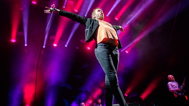 Tom Meighan on stage in 2018