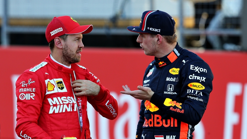 Vettel (l) and Verstappen in discussion during the 2019 season