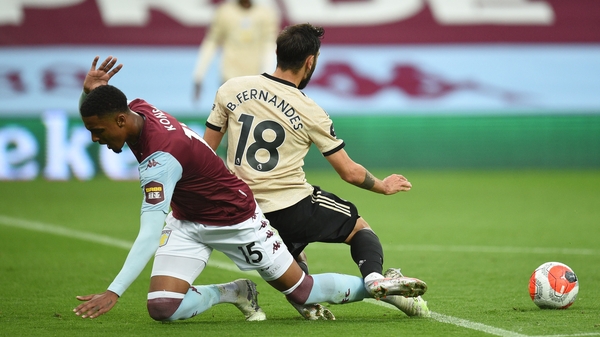 Bruno Fernandes goes down after the challenge by Konsa
