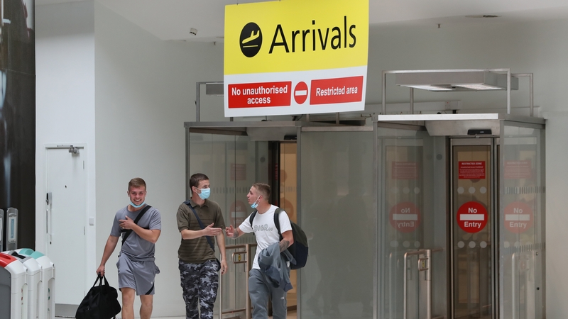Passengers at Belfast City Airport today - visitors from over 50 countries no longer have to self-isolate on arrival to Northern Ireland