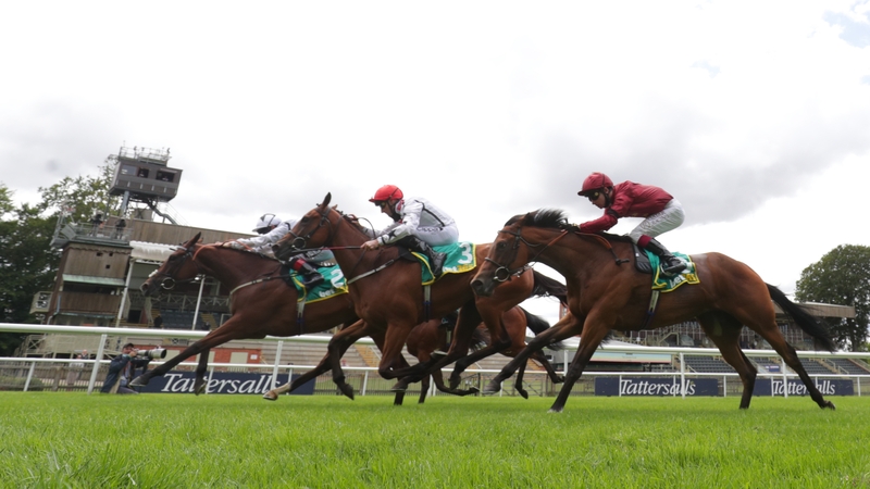 Dandalla (far side) wins the Duchess Of Cambridge Stakes at Newmarket in July
