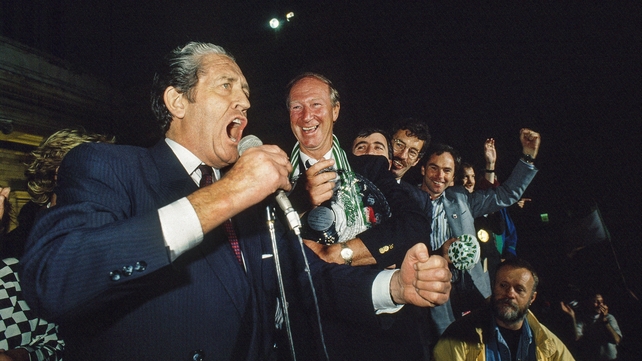 Joining Tanaiste Brian Lenihan for a song - Dick Spring, Tony Gregory and others gathered behind