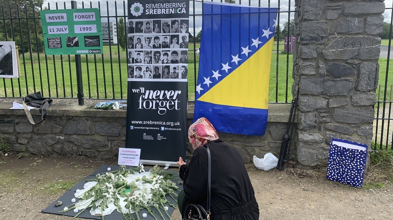 A woman pays her respects to those who died in Srebrenica at a peace vigil in Blanchardstown in Dublin