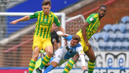 Blackburn Rovers' Joe Rothwell (centre) under pressure at Ewood Park