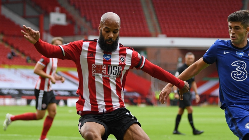 David McGoldrick (L) vies with Chelsea's Christian Pulisic (R) on Saturday