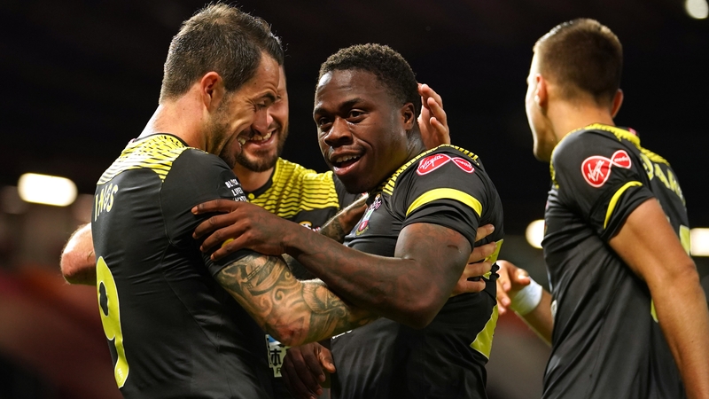 The Ireland international is congratulated by his teammates
