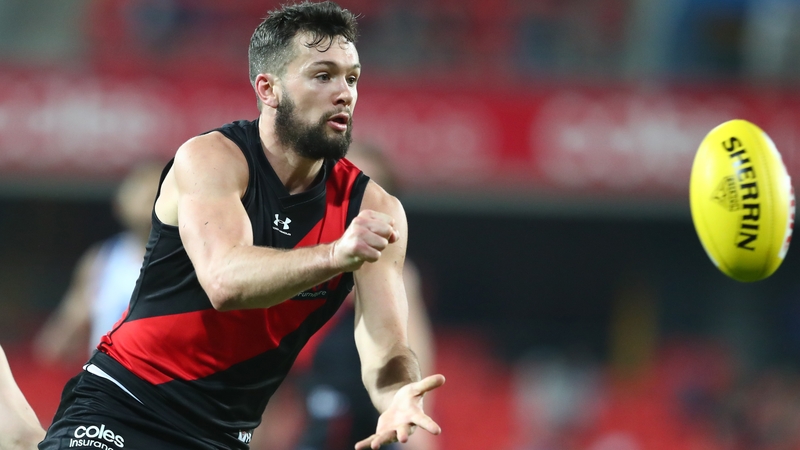 Conor McKenna in action for Essendon against North Melbourne at Metricon Stadium