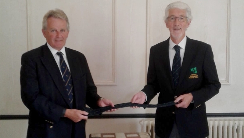 New Cricket Ireland President Philip Black (L) and outgoing President David O'Connor