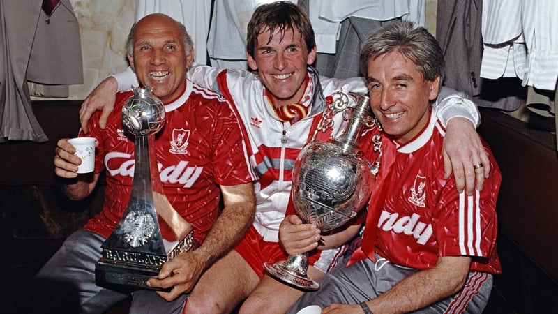 Ronnie Moran, Liverpool player-manager Kenny Dalglish and Roy Evans celebrate winning the 1989-90 Division One title
