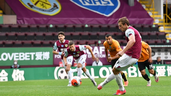 Chris Wood of Burnley scores from the spot