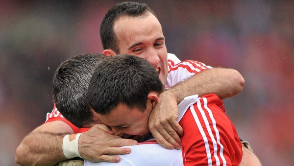 Cork goalkeeper Alan Quirke (R) celebrates with team-mates Graham Canty (L) and Kieran O'Connor at the end of the 2010 All-Ireland final