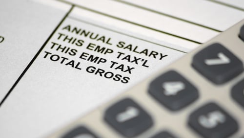 Taxes paid by workers rose last year as higher wages pushed earners into higher tax brackets, the OECD said today