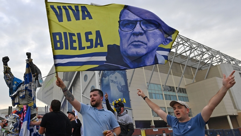 Fans celebrate promotion outside Elland Road, which once more belongs to the club