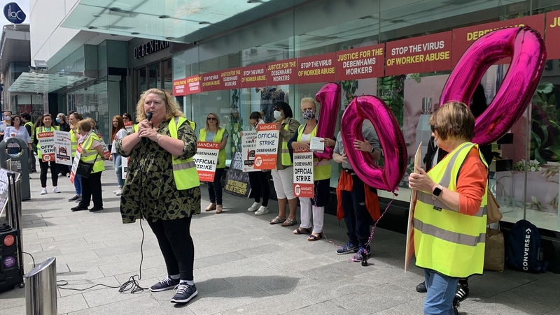 About 30 people are protesting outside Debenhams' Henry Street store this afternoon