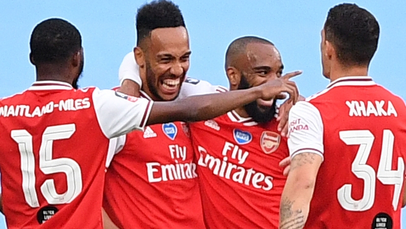 Pierre-Emerick Aubameyang (second from left) scored in both halves