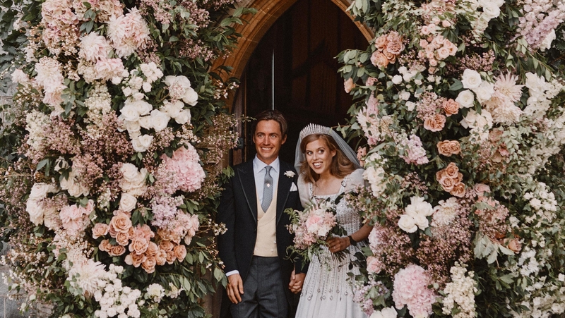 The bride wore an upcycled gown lent to her by Queen Elizabeth.