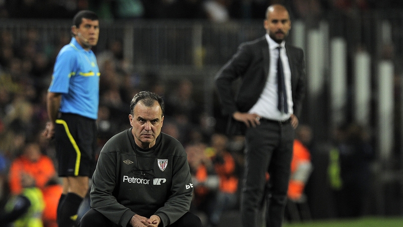 Marcelo Bielsa (C) and Pep Guardiola sharing a sideline in 2012 when they were in charge of Athletic Bilbao and Barcelona respectively